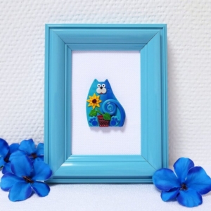 Obrázek kočka a slunečnice v modrém rámečku